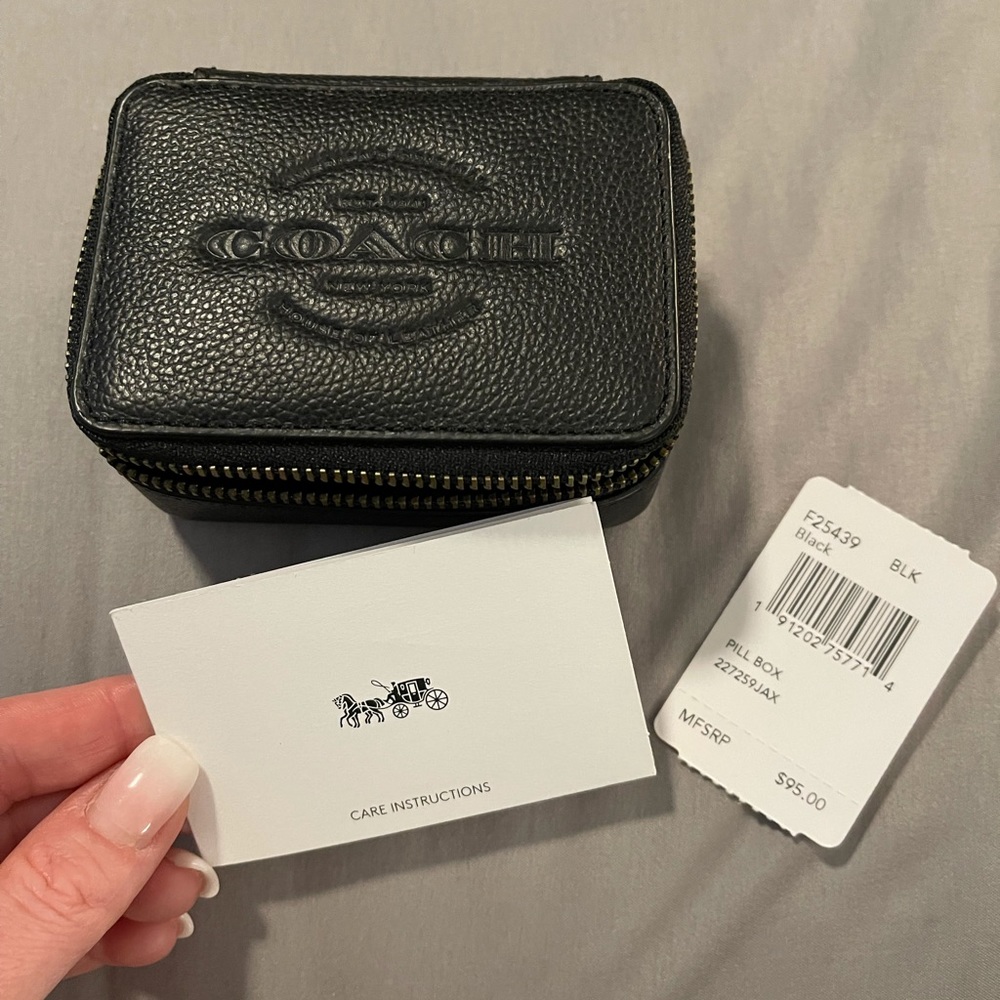 New with tags Coach pill bottle case